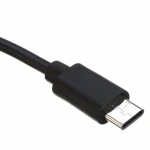 Cargador Nintendo Switch cable 3 metros conectado a consola en uso